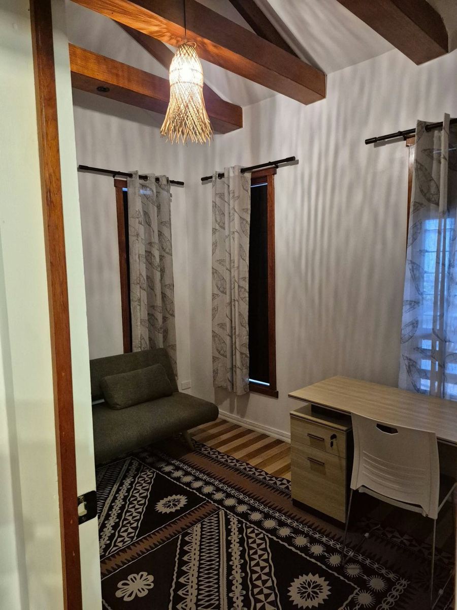 Study with exposed beams and new timber windows