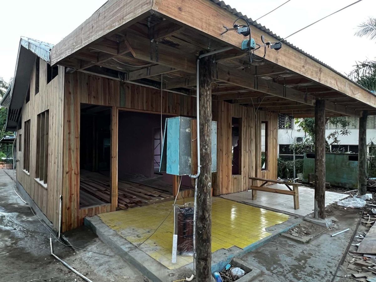 New vertical timber cladding and porch roof
