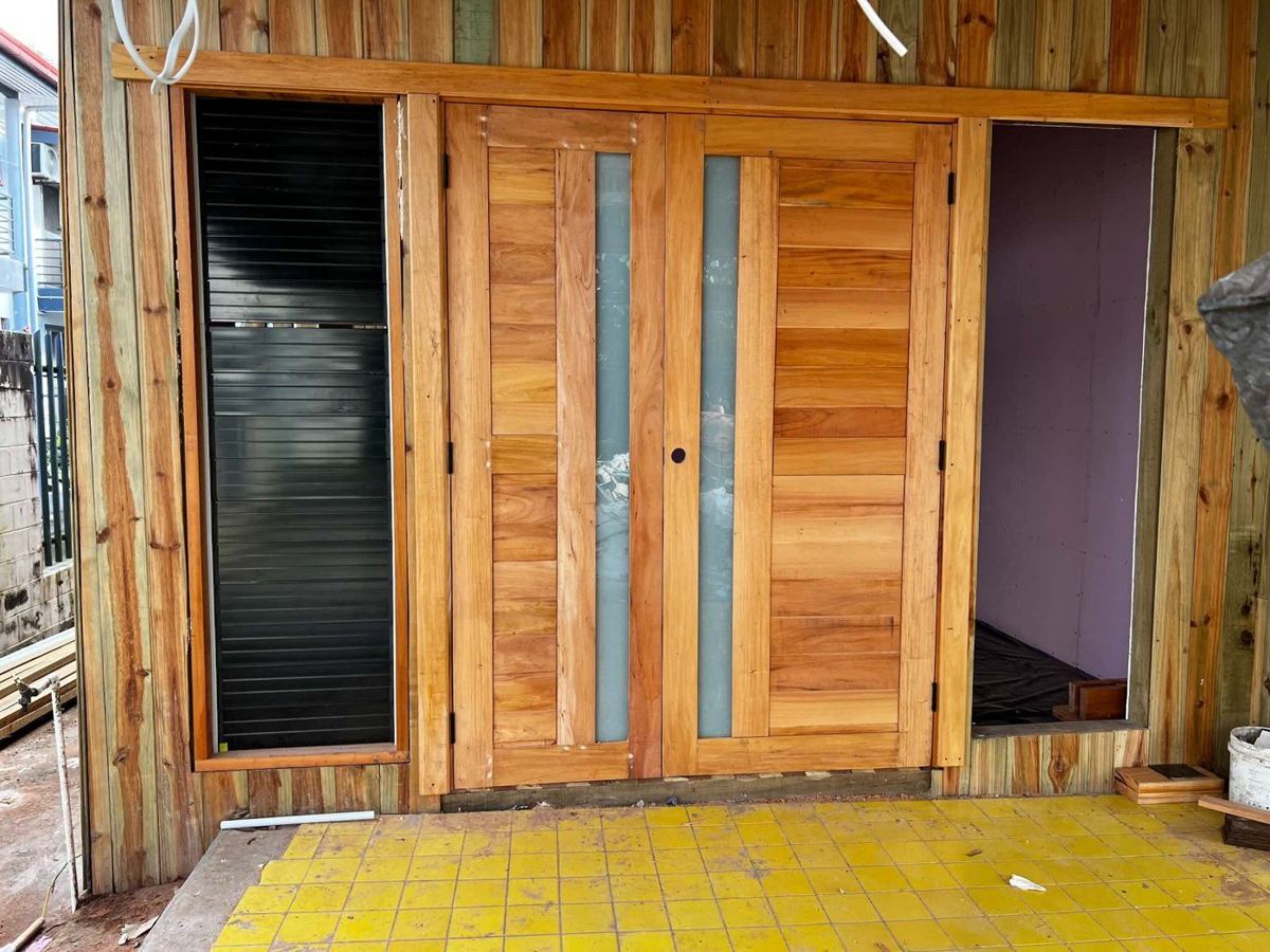 Timber double doors built by the team
