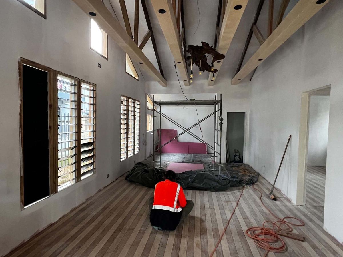 Lined interior, timber louvre windows and exposed rafters