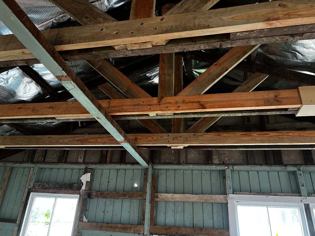 New timbers bolted into the existing roof framing