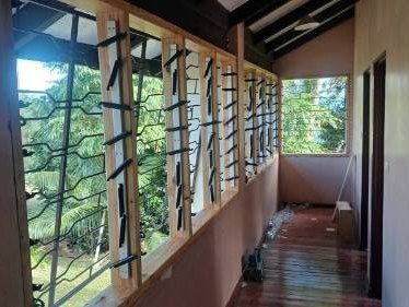 New timber frames and aluminium louvres