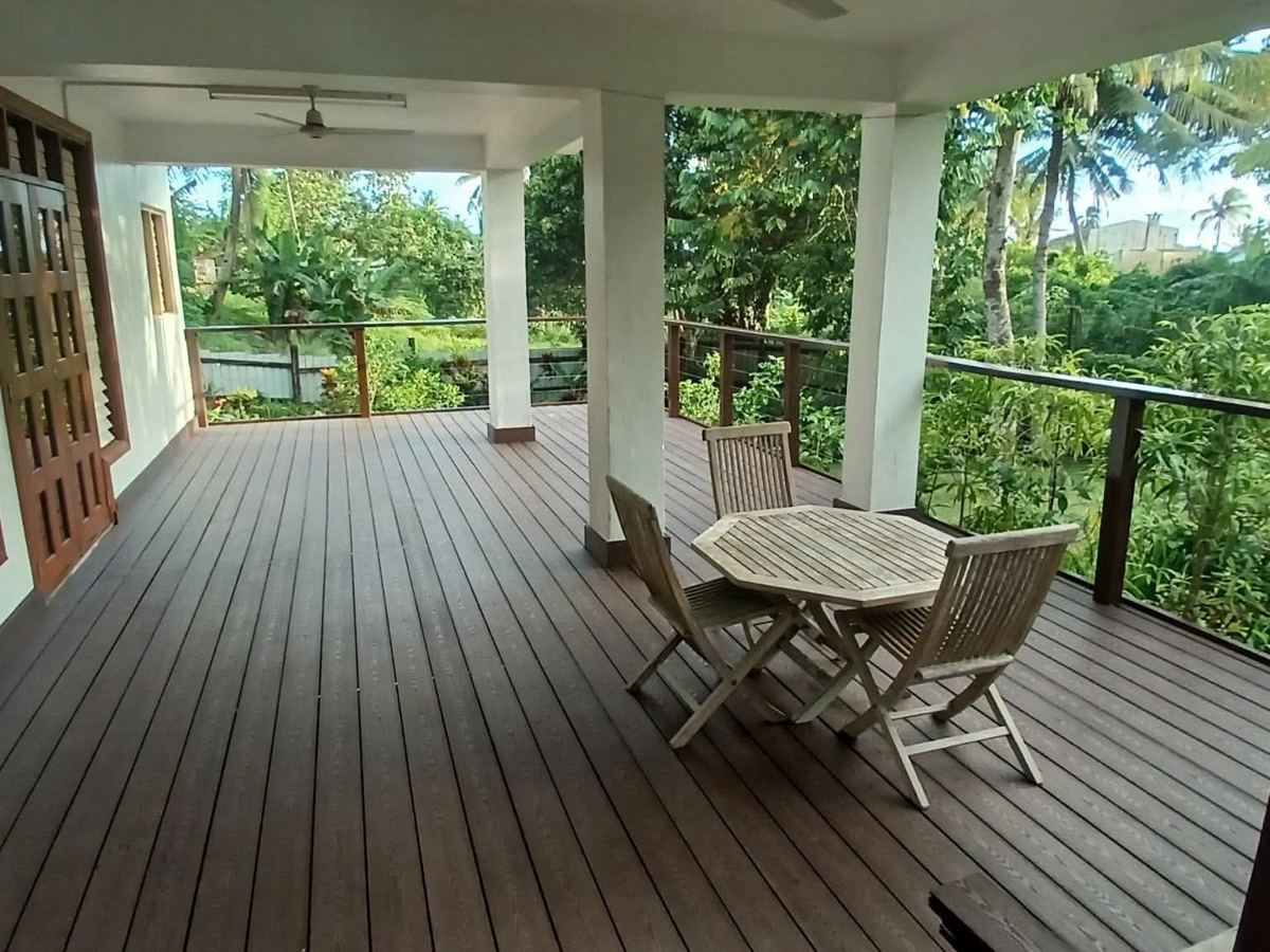 New WPC composite decking, finished around the columns