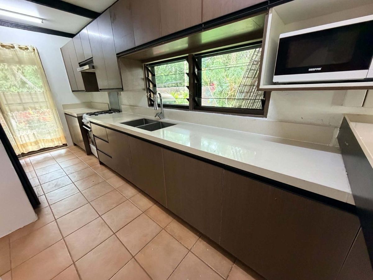 New cabinetry, benchtop and double sink