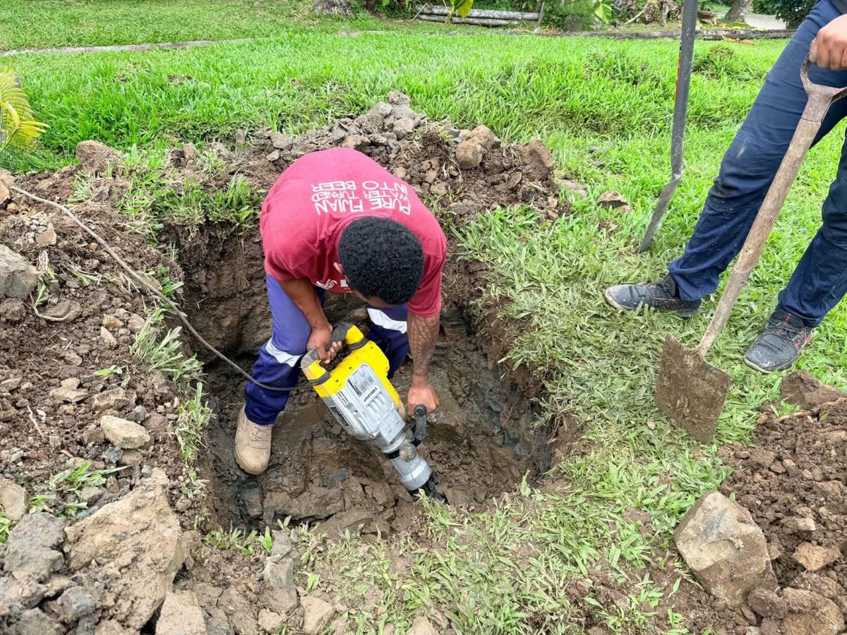 Breaking out rock for the soak pit