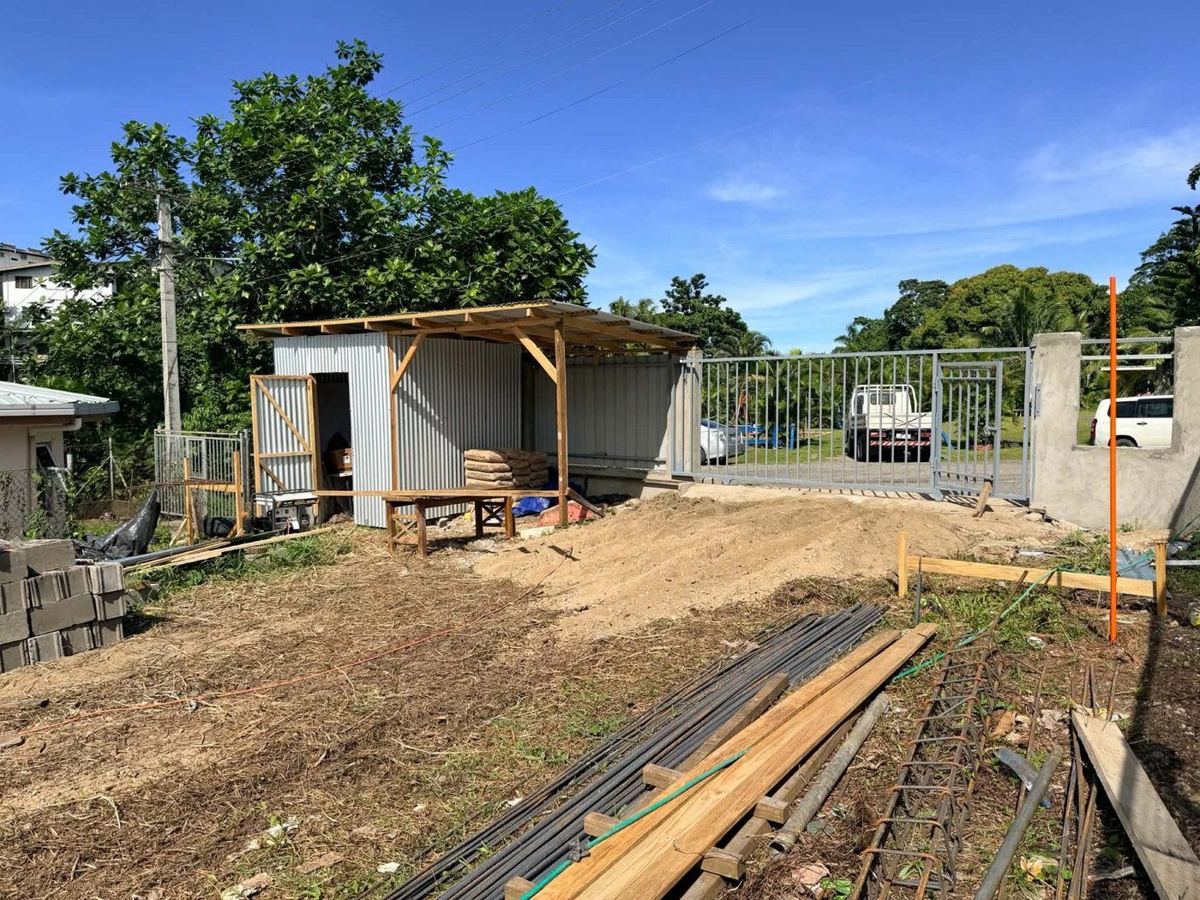 Rendered boundary fence and steel sliding gate