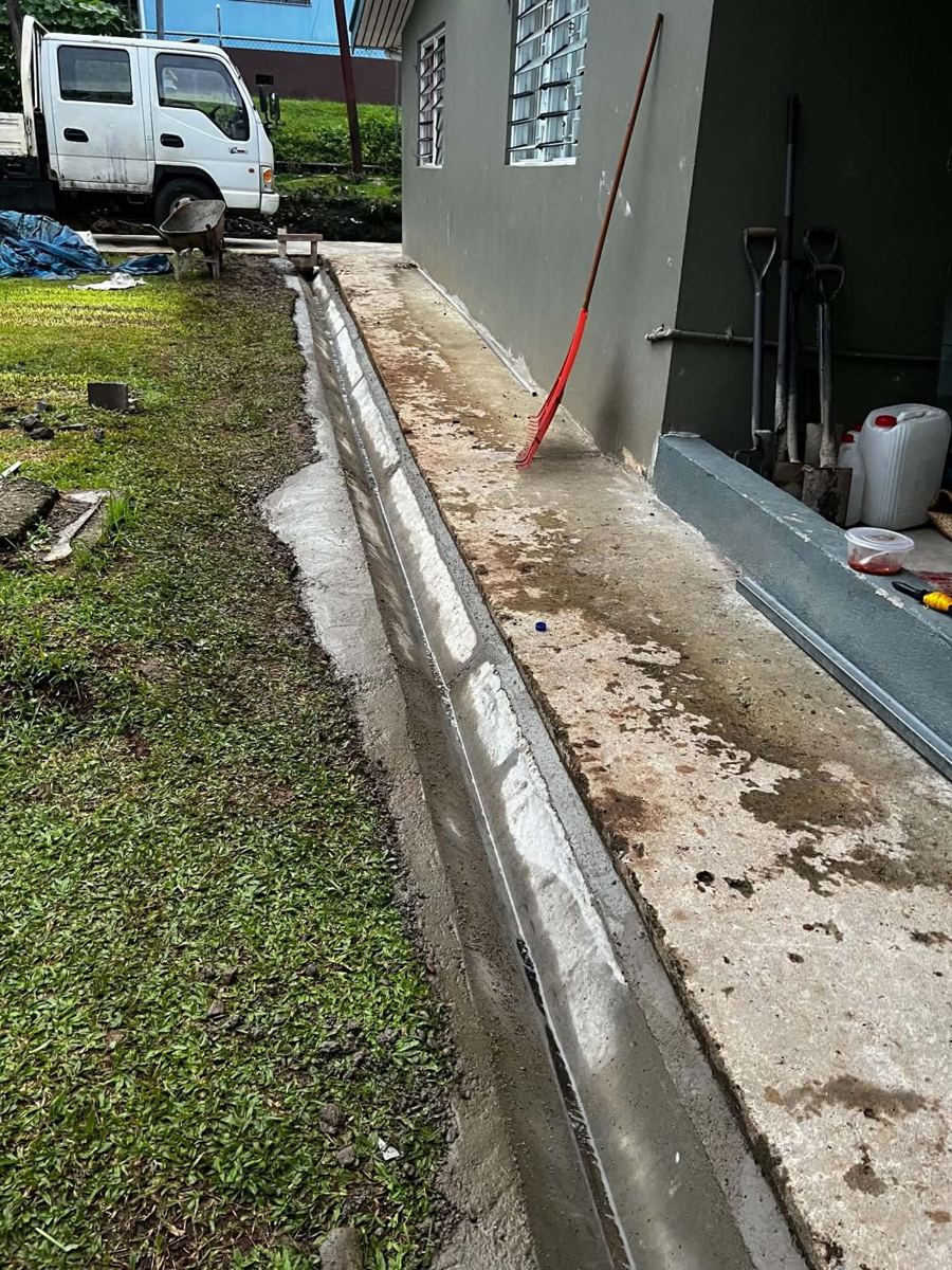 Drainage — after: completed concrete V-drain